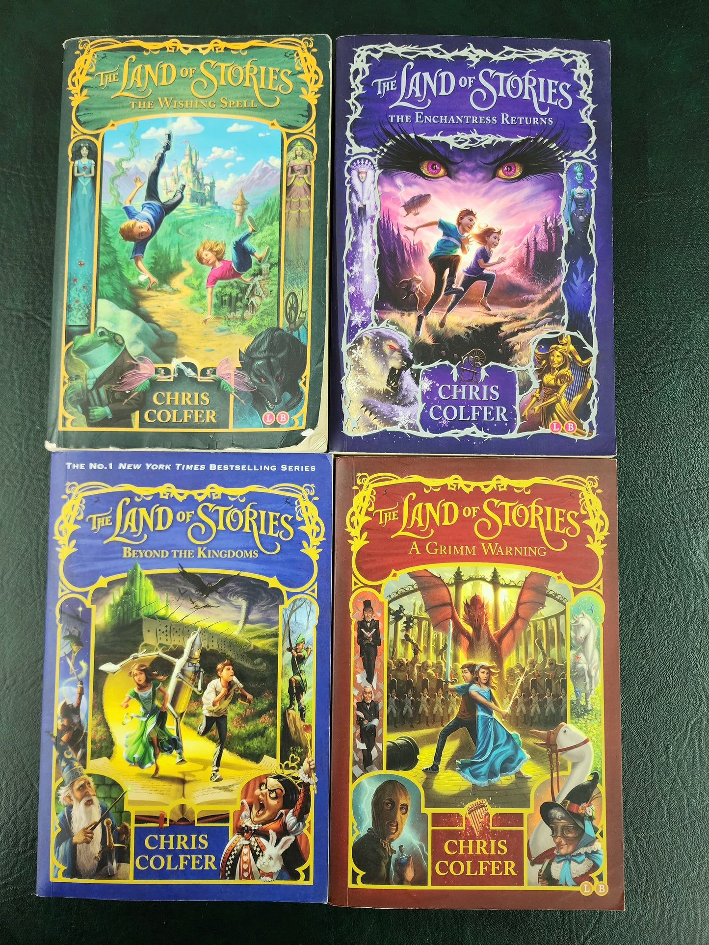 The Land of Stories by Chris Colfer, set of 4 books