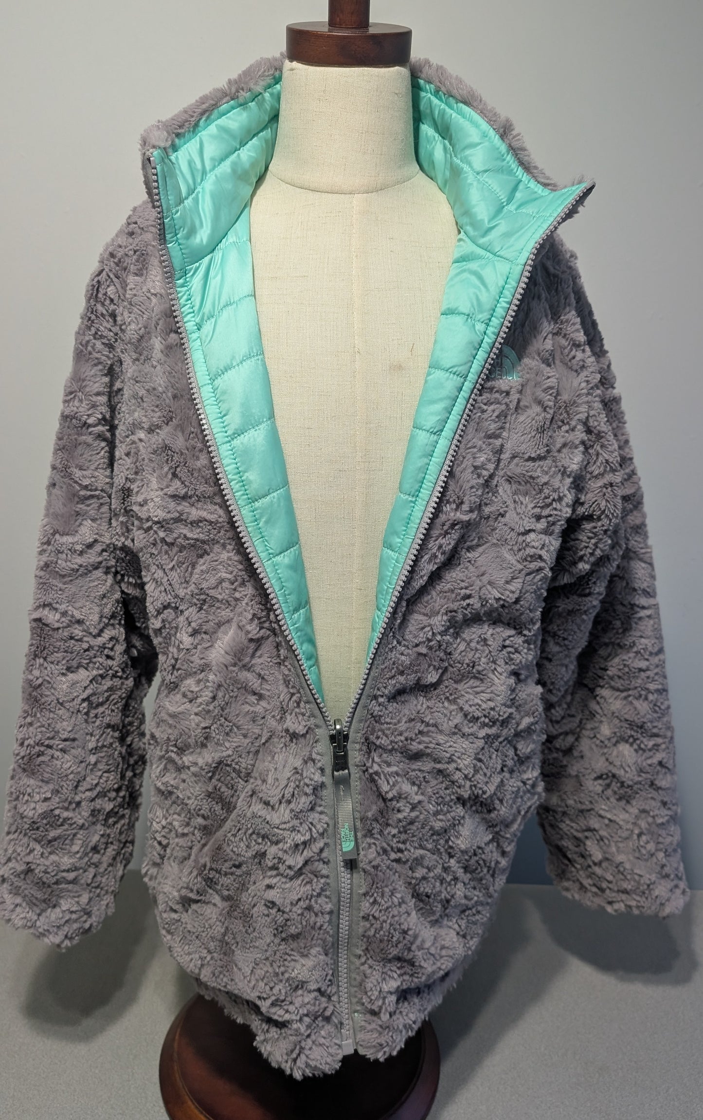 North Face reversible teal jacket, size 10-12